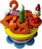 Geburtstagstorte als Spieluhr und Zahlen aus Holz