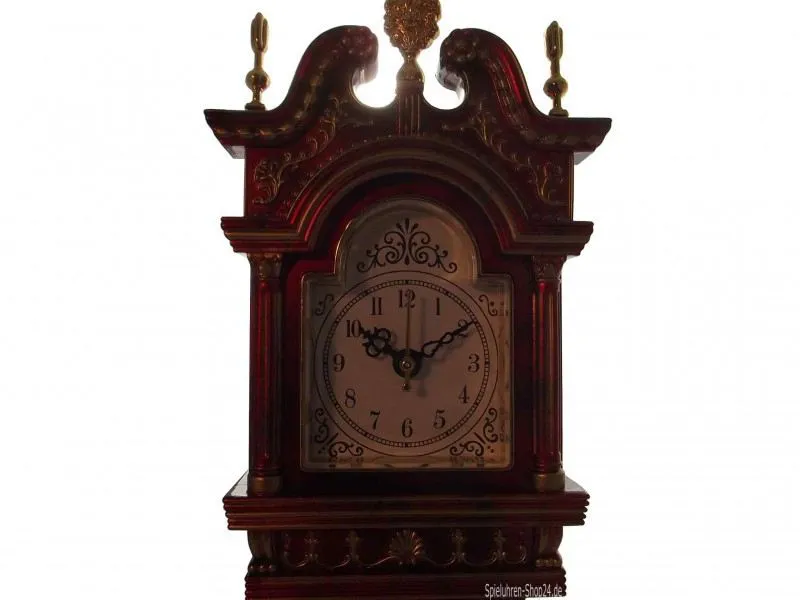Standuhr mit Uhr und Spieluhr, Kopfteil Vorderansicht mit funktionierender Uhr