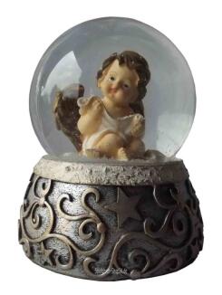 Engel Putte liest von Papierrolle in Spieluhr Schneekugel