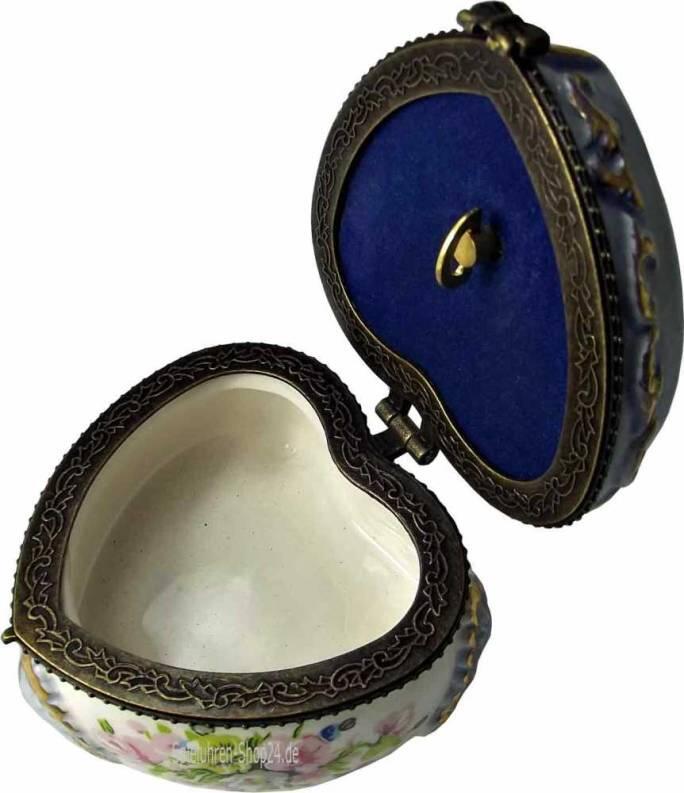 Pillendose Porzellan  Frühlingsblumen  mit Miniatur-Spieluhr, gut sichtbar der verzierte