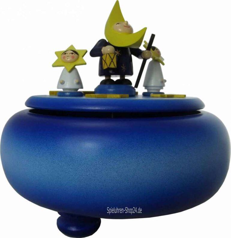 Die bauchige blaue Musikdose mit der dreiteiligen Mondgruppe von der Seite gesehen