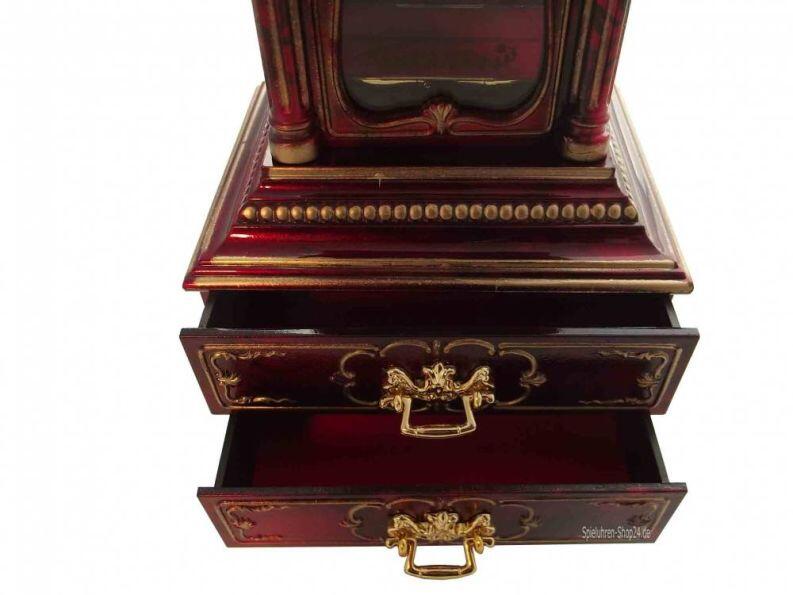 Standuhr mit Uhr und Spieluhr, Ansicht Unterteil mit zwei geöffneten Schubladen, obere zu öffnen zum