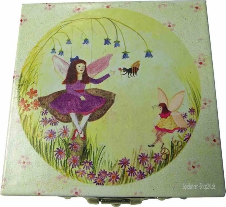 Blumen-Fee im lila Kleid auf bezaubernder Zahnbox