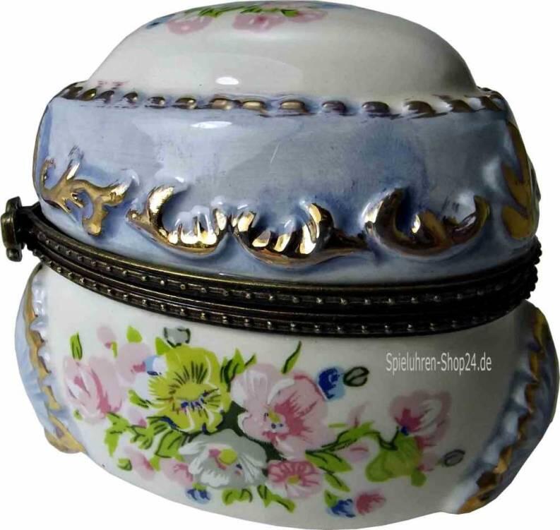 Pillendose Porzellan  Frühlingsblumen  mit Miniatur-Spieluhr, von der Seite